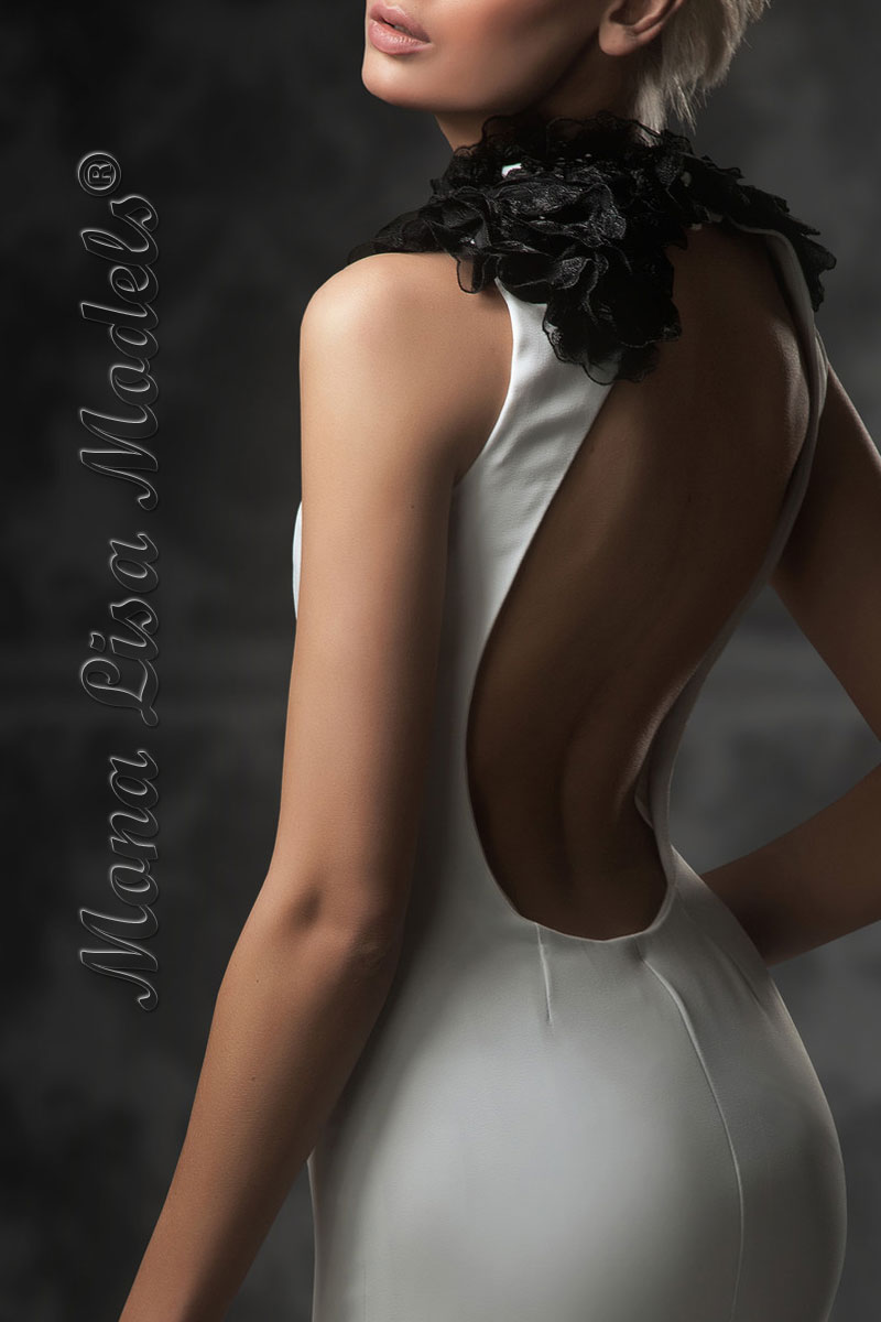 Model in white dress from Rose Bay escorts