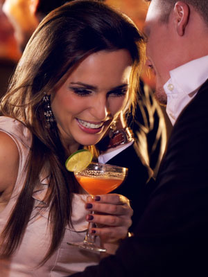 Beautiful Couple drinking coctails