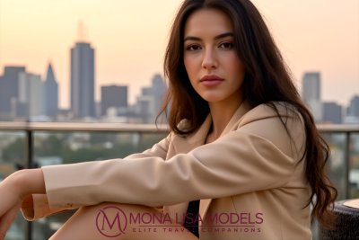 Melbourne escorts - model seating on a roof top